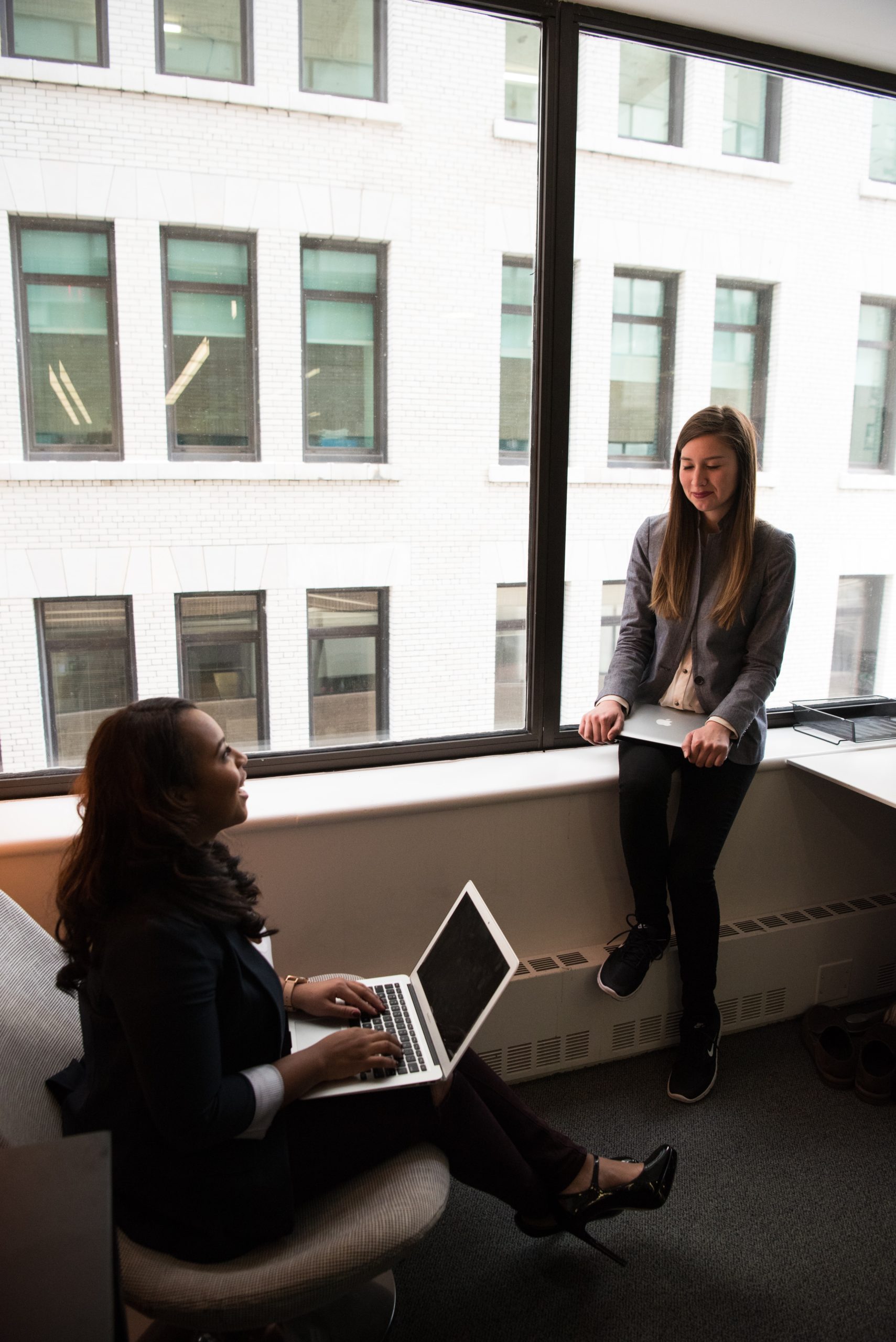 Two Businesswomen Talking