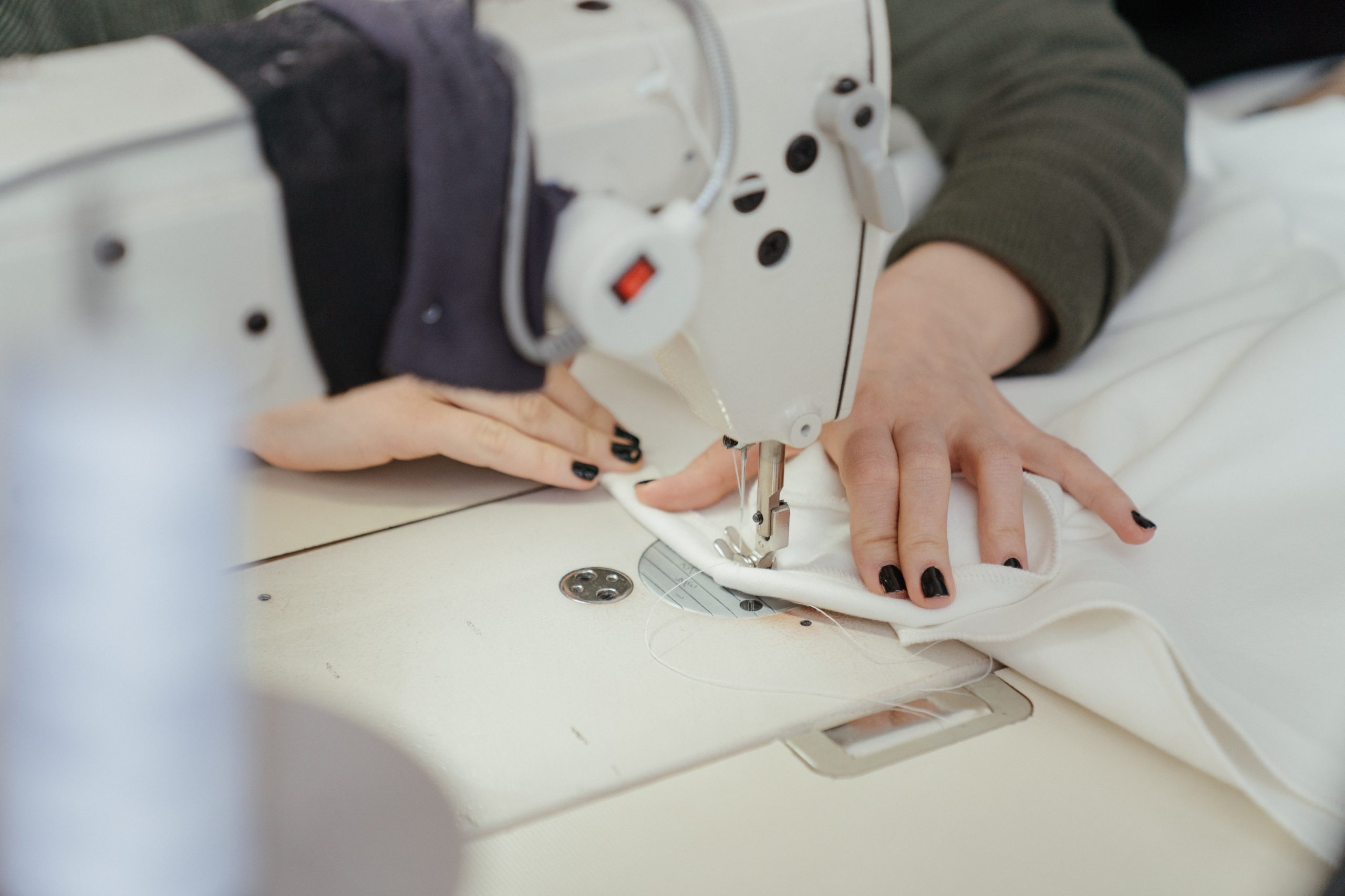 woman using a sewing machine